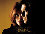 Pierce Brosnan, Rene Russo dans Thomas Crown - Wallpaper